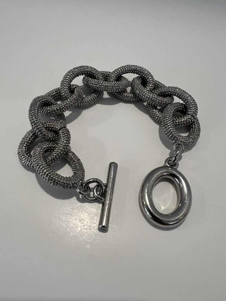 Banana Republic textured heavy silvertone chain bracelet with a toggle closure.