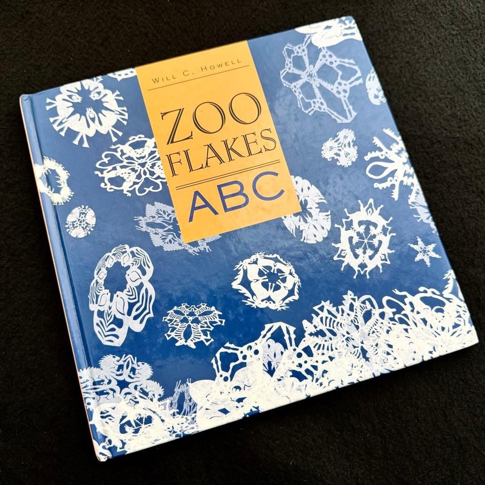 Zoo Flakes ABC Animal Paper-Cut Alphabet Book by Will C. Howell