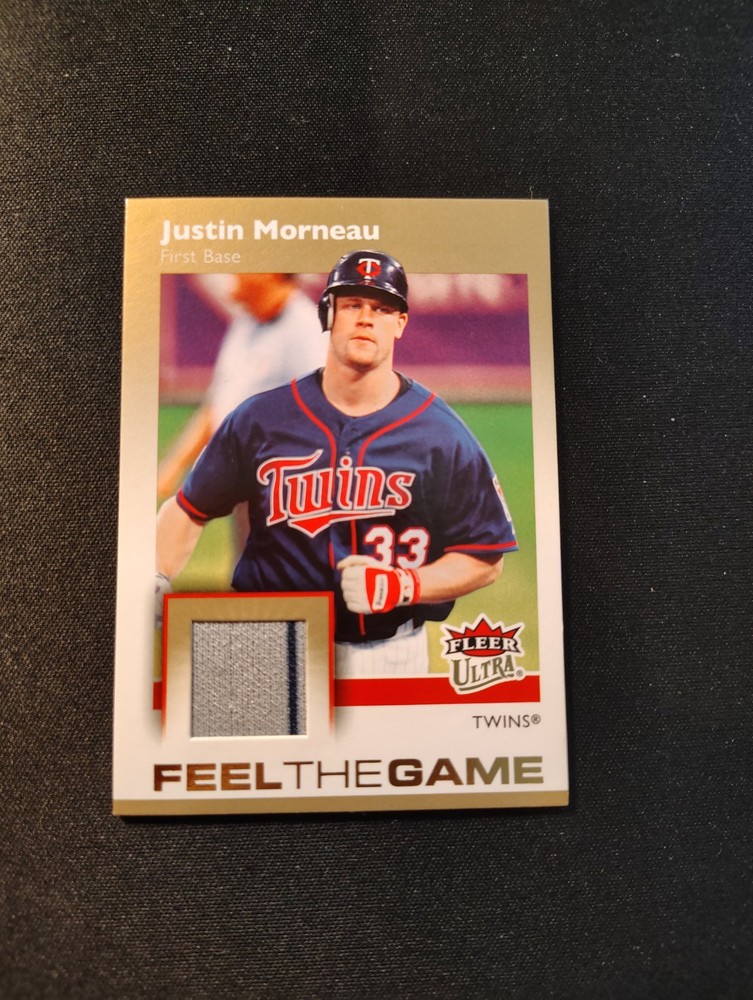 2007 Fleer Ultra - Feel the Game Justin Morneau #FG-JM Materials (MEM)