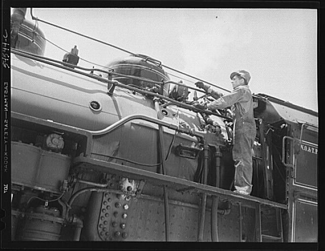 Photo:Railroad Steam Locomotive Mechanic 1940s Engineer Working on Engine