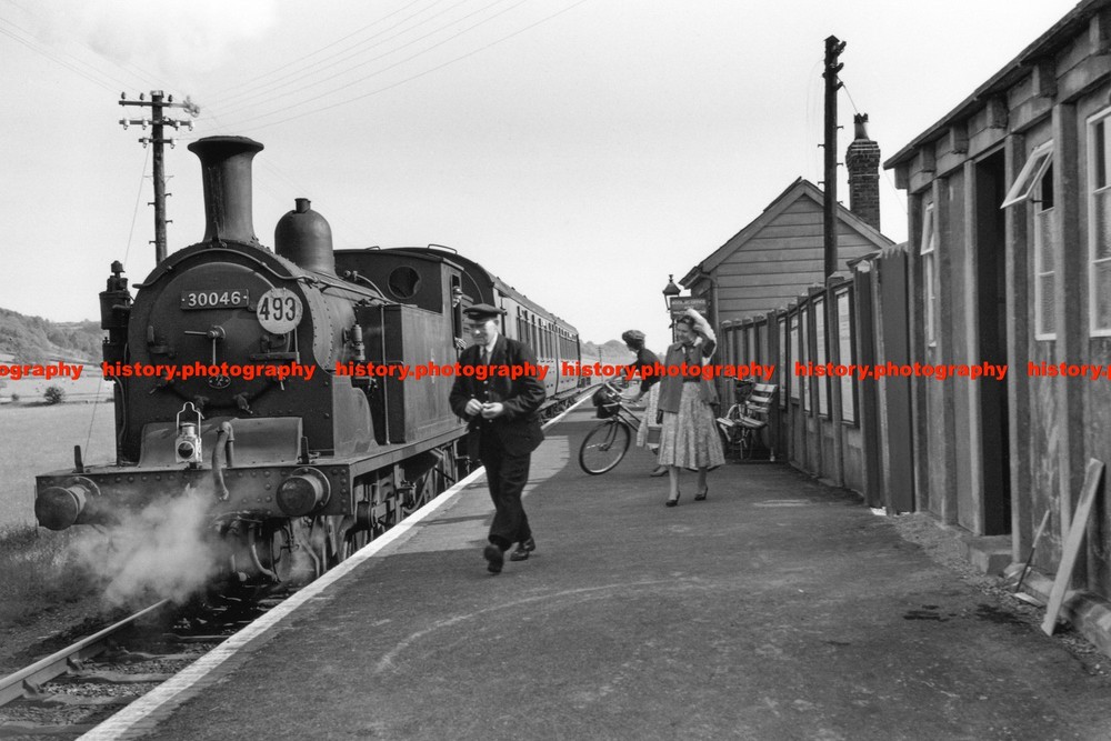 F022038 Guard at Colyford station Devon Great Britain 1940s