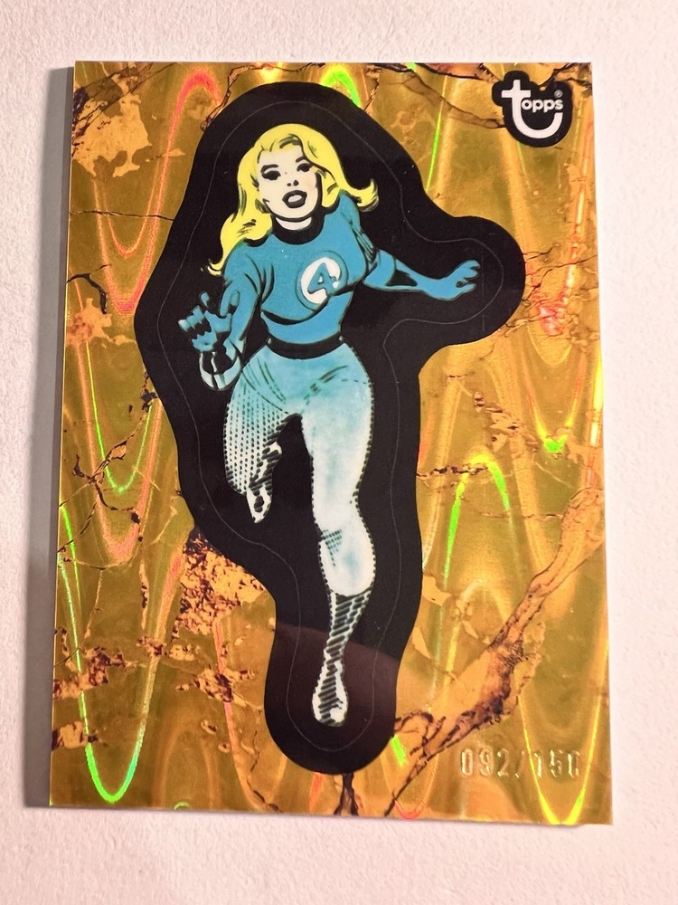 2025 Topps Marvel 1975 Comic Book Heroes Invisible Woman 44 Gold Raywave /150