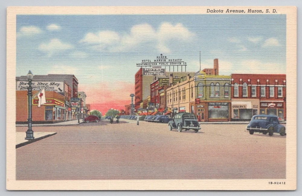 Huron SD Dakota Avenue Vintage Linen Postcard 1941 Cars Hotel Marvin Hughitt