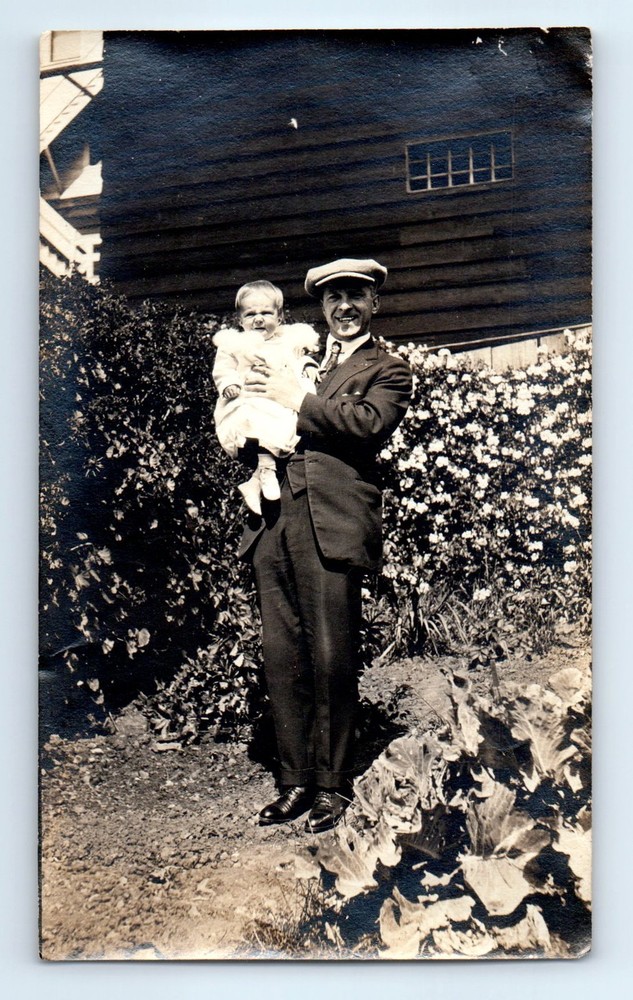 Old Vintage Photo MAN WITH SUIT NEWSBOY CAP HAT HOLDING BABY OUTSIDE HOUSE