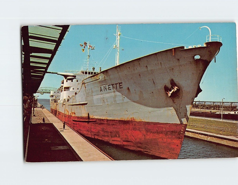 Postcard An Ocean Freighter In The Soo Locks Sault Ste. Marie Michigan USA