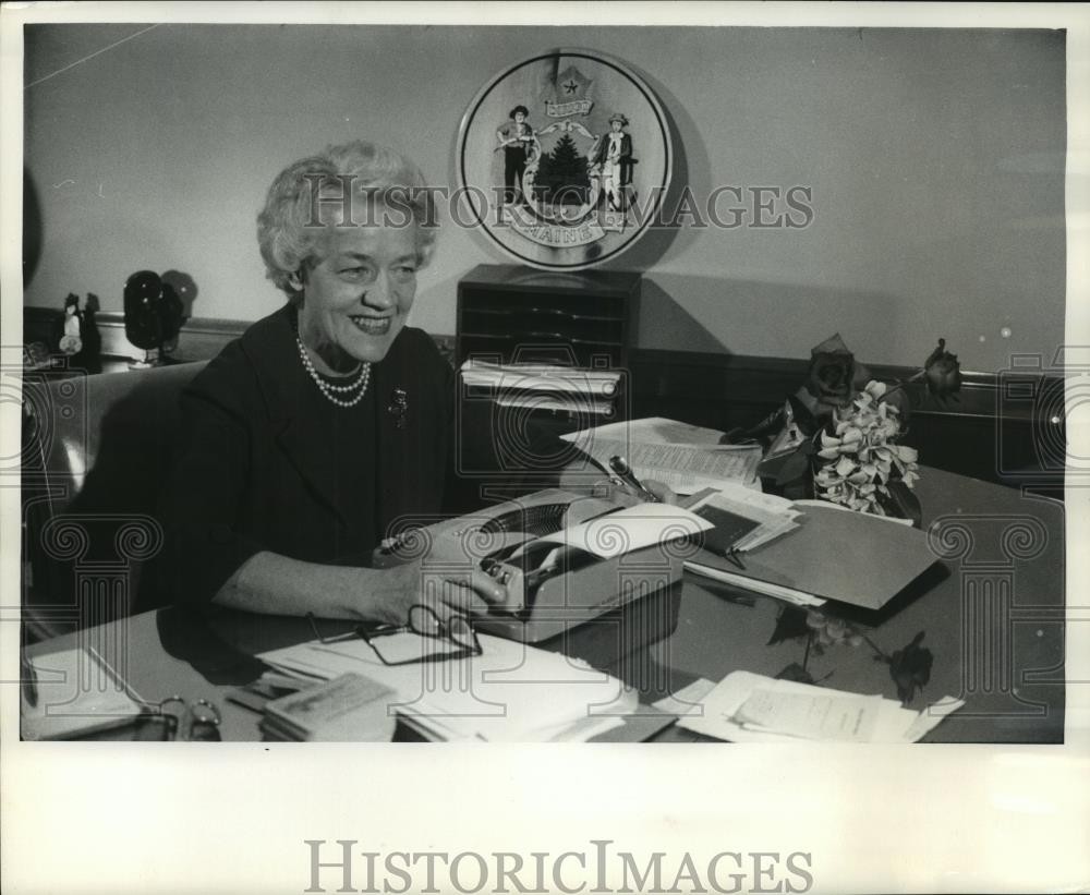 1964 Press Photo Senator Margaret Chase Smith typing a letter at her desk.
