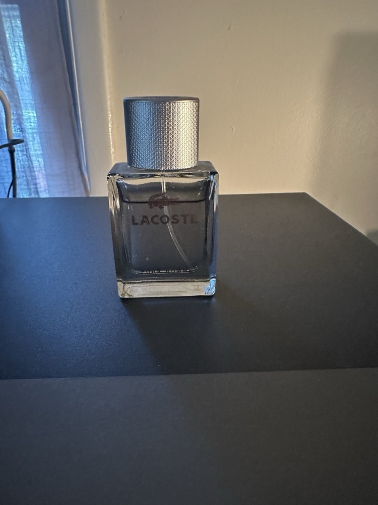 lacoste pour homme 1.oz Men EDT Level As Shown