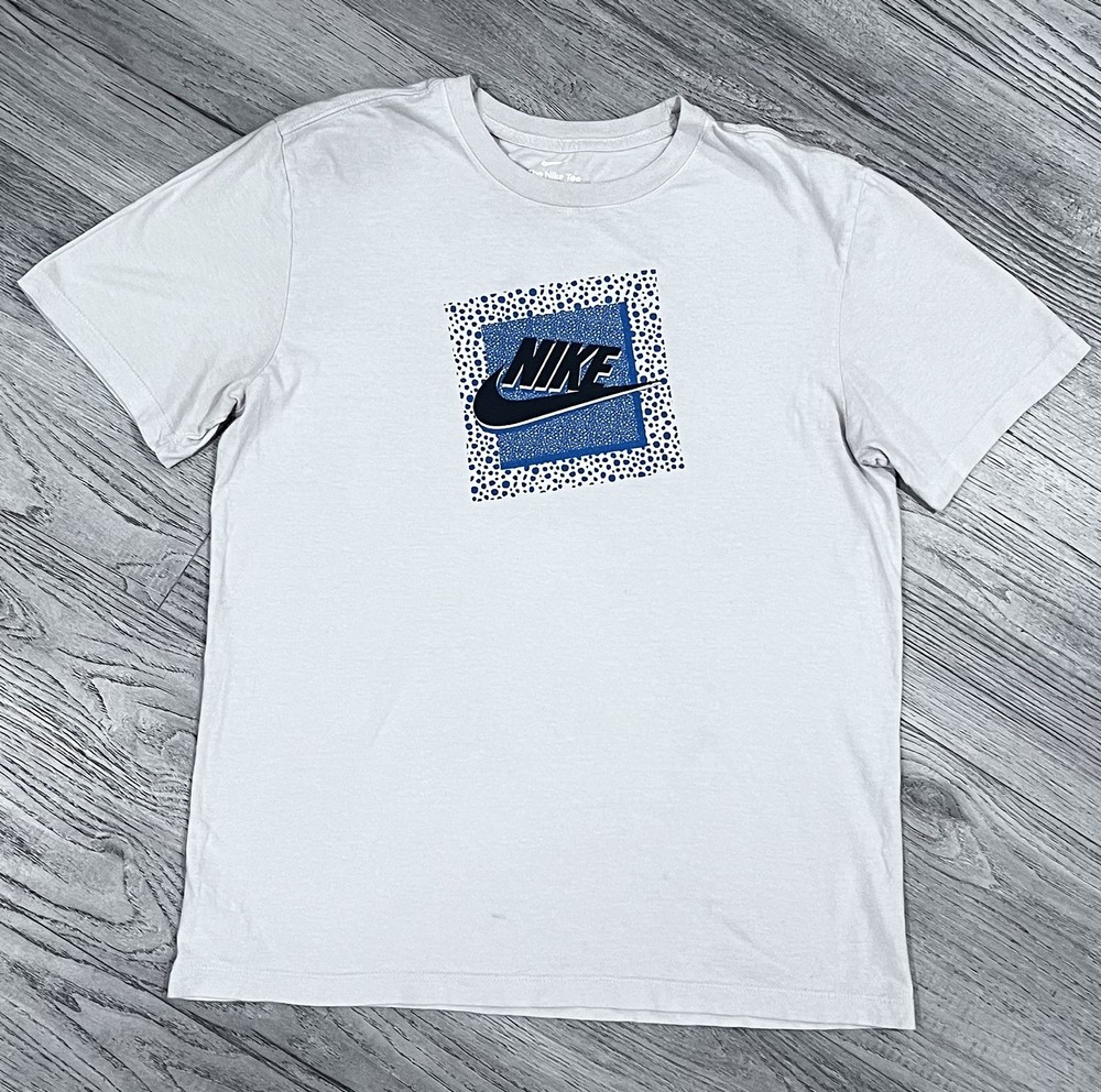 “TILTED  SWOOSH“