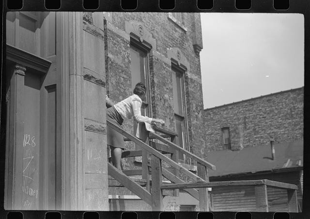 Chicago Illinois Black Belt 1941 Kitchenette Apartment House Woman on Stoop