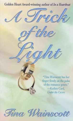 A Trick Of The Light - Paperback, by Wainscott Tina - Acceptable