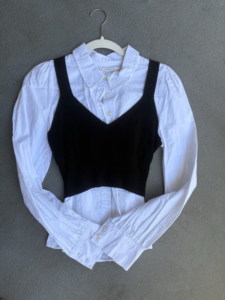 Anthropologie layered white collared blouse with black overlay.