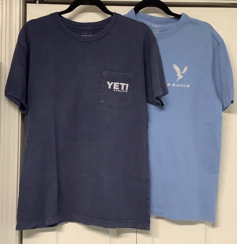 Lot of 2 Men's Medium T-Shirts: 1 Navy YETI w/pocket & 1 Light Bl American Eagle