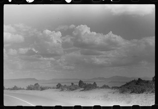 Photo:1930s Desert Road Landscape Mountains Cloudy Sky Scenic View