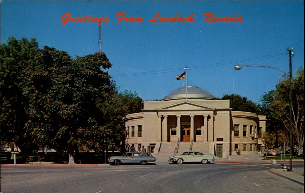 Greetings Lovelock Nevada ~ Pershing County Court House ~ 1960s cars ~ postcard