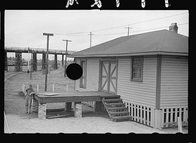 Photo:1930s Railroad Depot Platform Man Standing Station Building