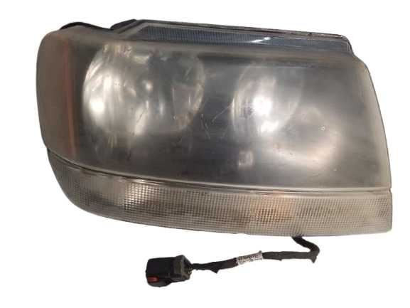02-04 Grand Cherokee Smoke Tint Passenger Headlight Dark Background 276001