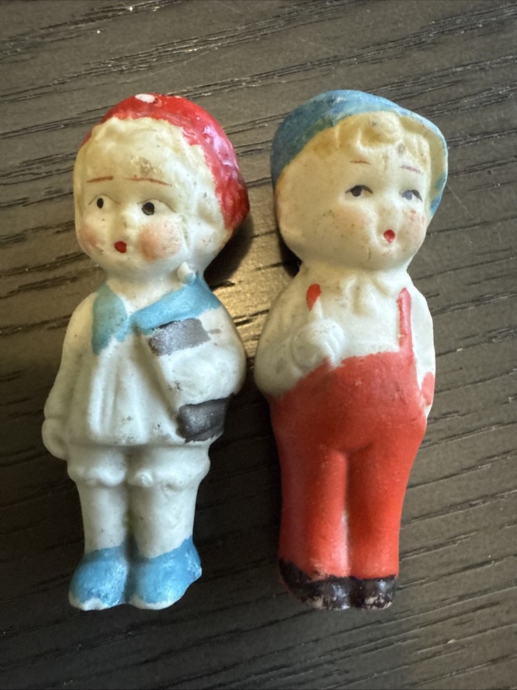 Two dolls sold as pair/ boy and girl 2.75 inches tall porcelain dolls from Japan