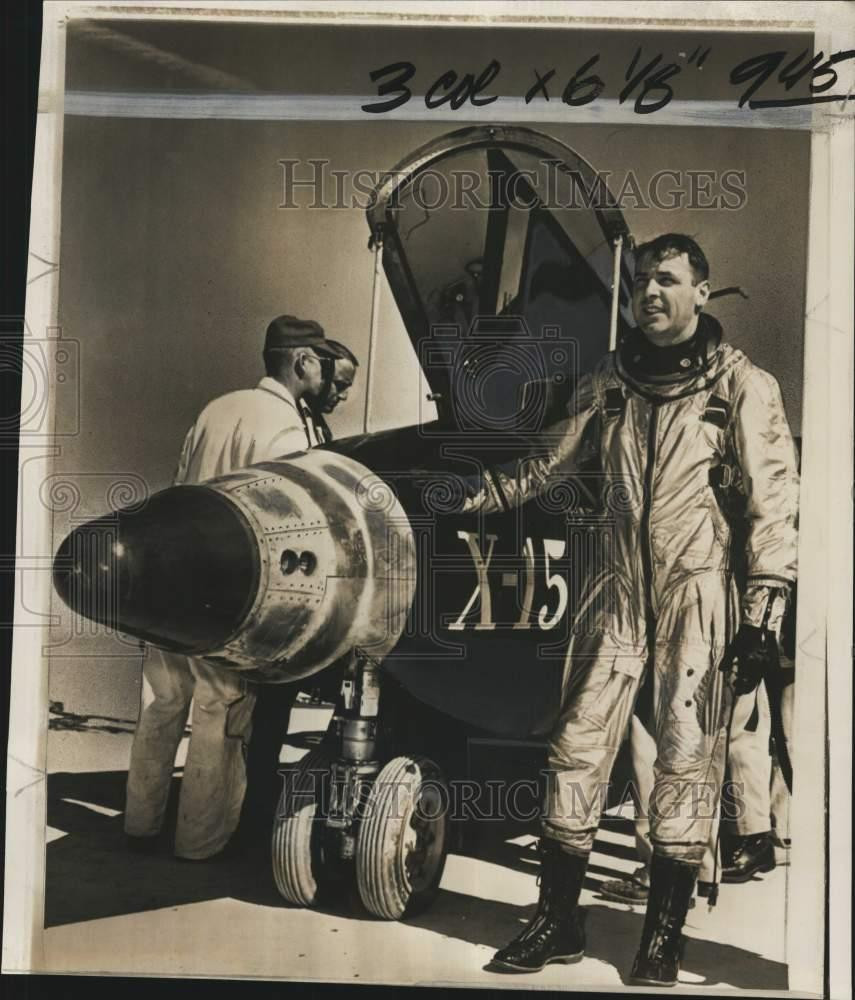 1961 Press Photo Major Bob White stands with X15 plane at California air base