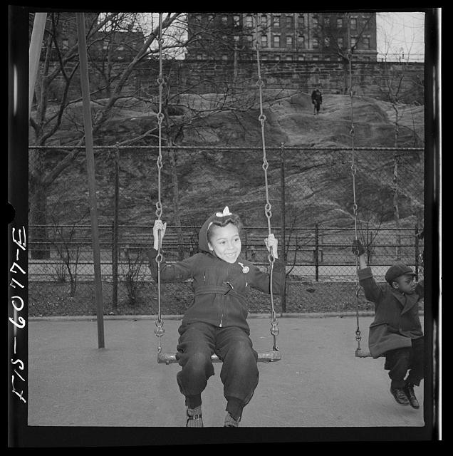 Photo:New York City 1930s children on swings in park playground