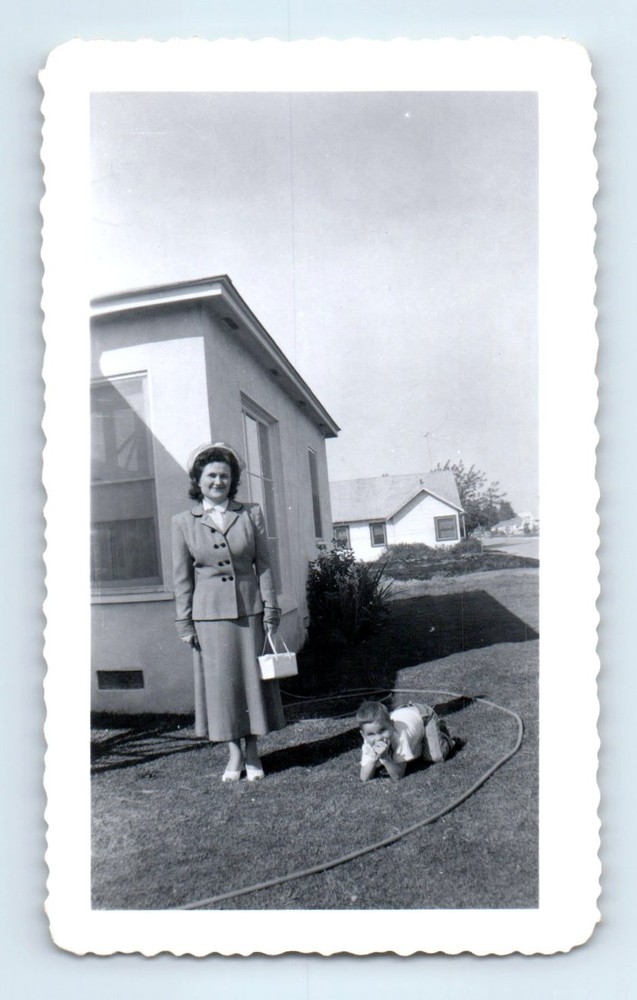 Old Vintage Photo WOMAN WITH PURSE BOY ON GRASS LAWN OUTSIDE HOUSE SNAPSHOT