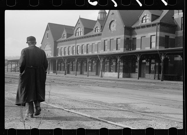 Photo:Dubuque Iowa Railroad Depot Man on Tracks 1940