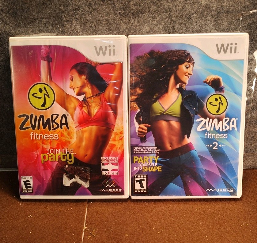 Lot Of 2 Nintendo WII Zumba Fitness Games And Booklets
