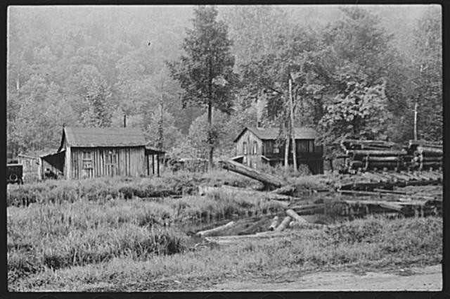 Photo:Erwin West Virginia 1938 Homes Near Sawmill Log Pile Lumber Mill