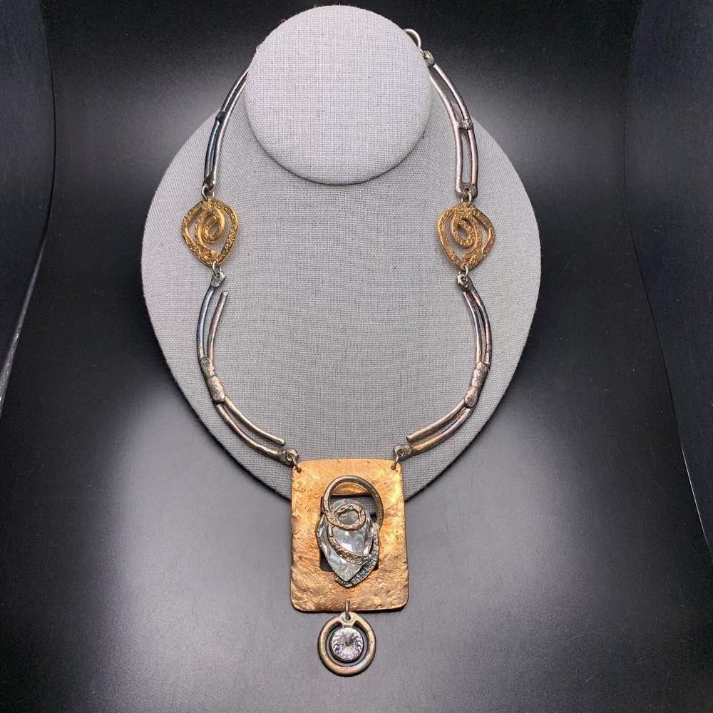 Abstract silver gold hammered necklace with bold glass accent  -image