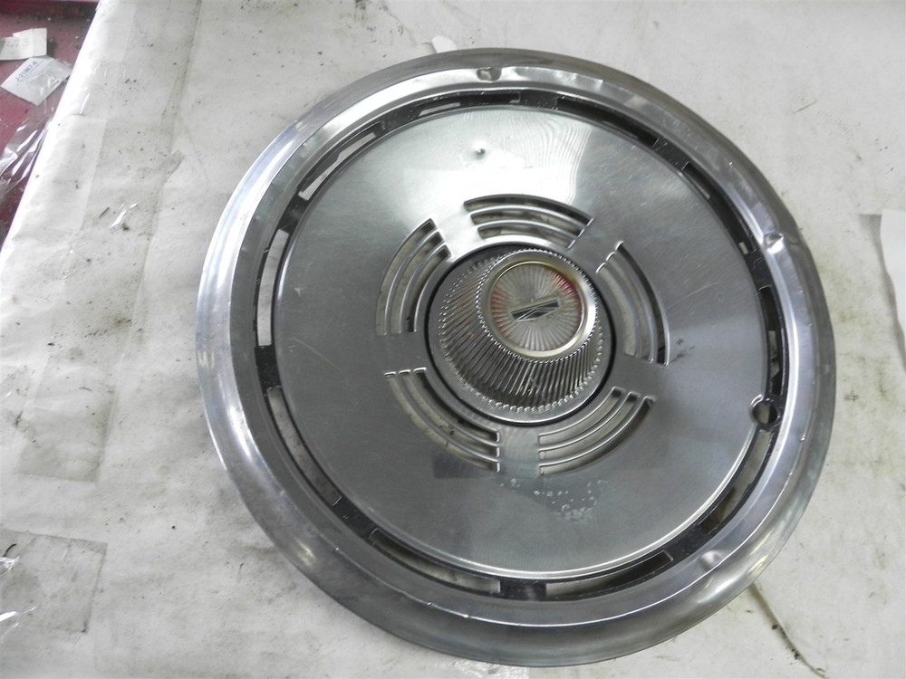1974-1976 Ford 14-inch vintage hubcap wheel cover with ding retro automotive