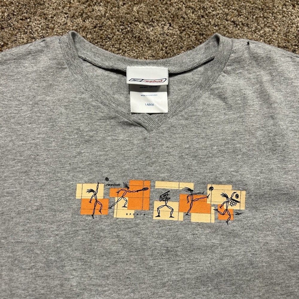 Vintage 90s Reebok sports graphic v neck tshirt size women’s large