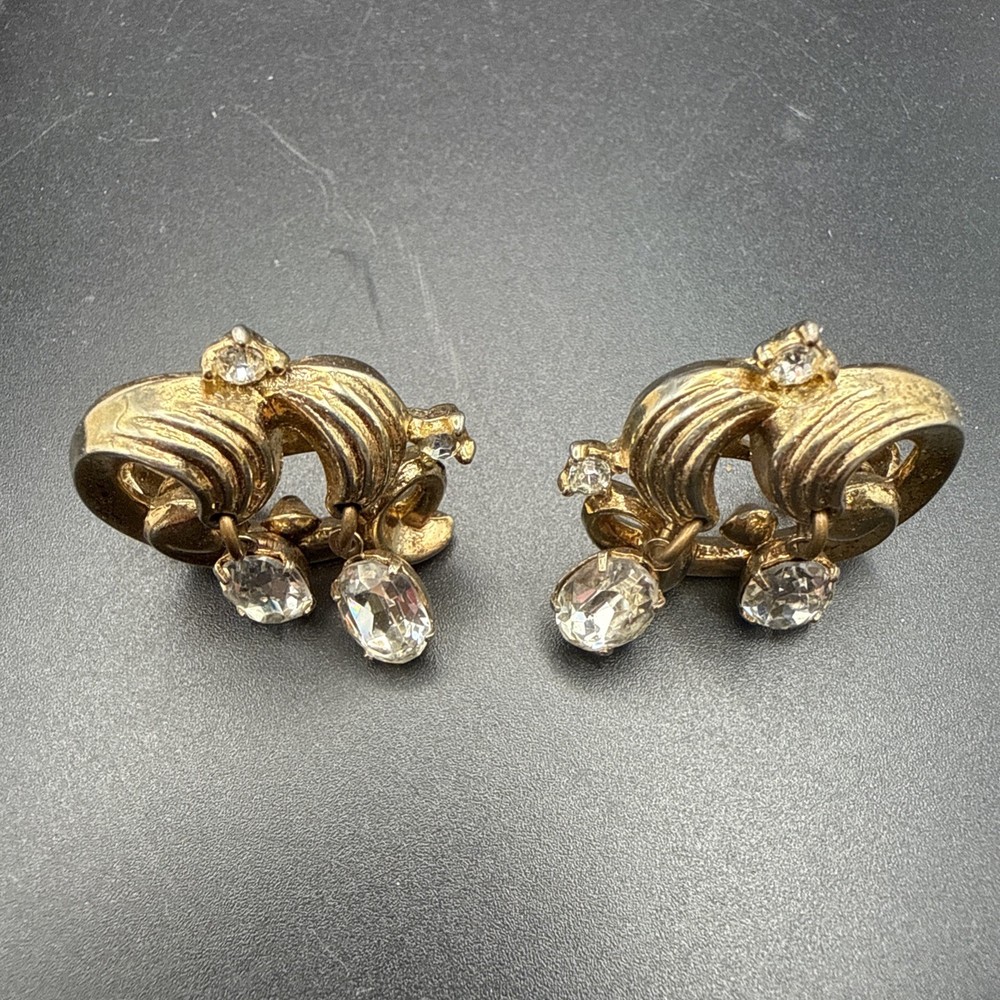 Vintage Crown Trifari Gold Tone Swirl Clip-On Earrings Clear Rhinestone Dangles
