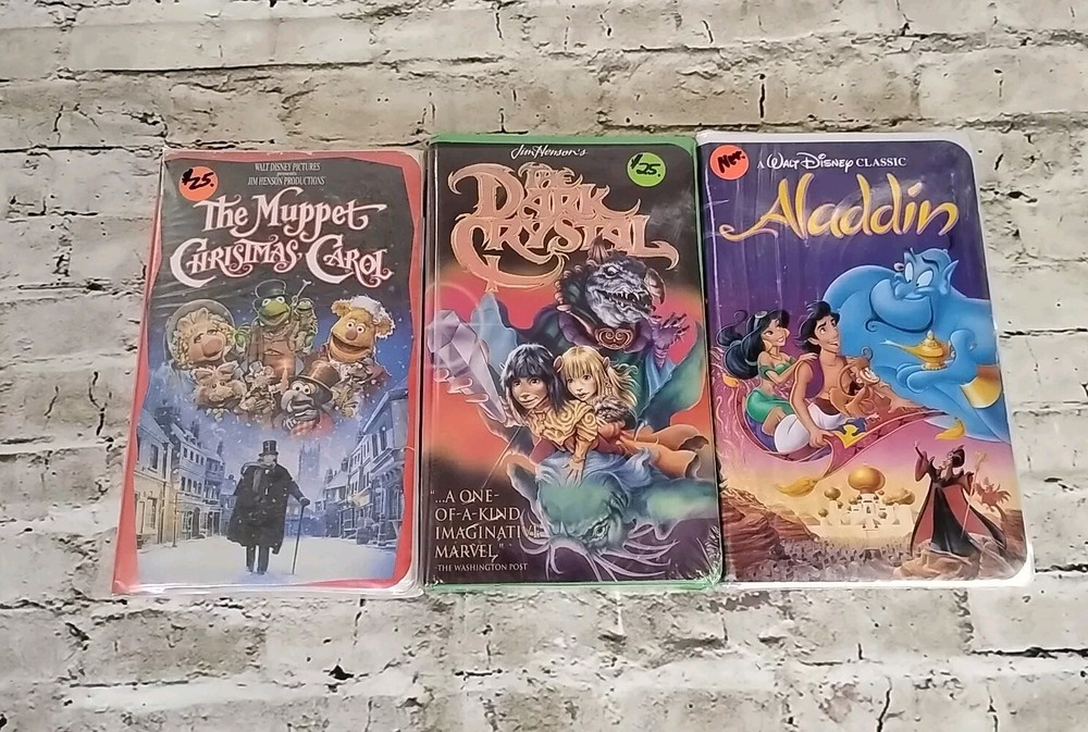 Lot of 3 Disney VHS Clam shell The Dark Crystal Aladdin Muppet Christmas