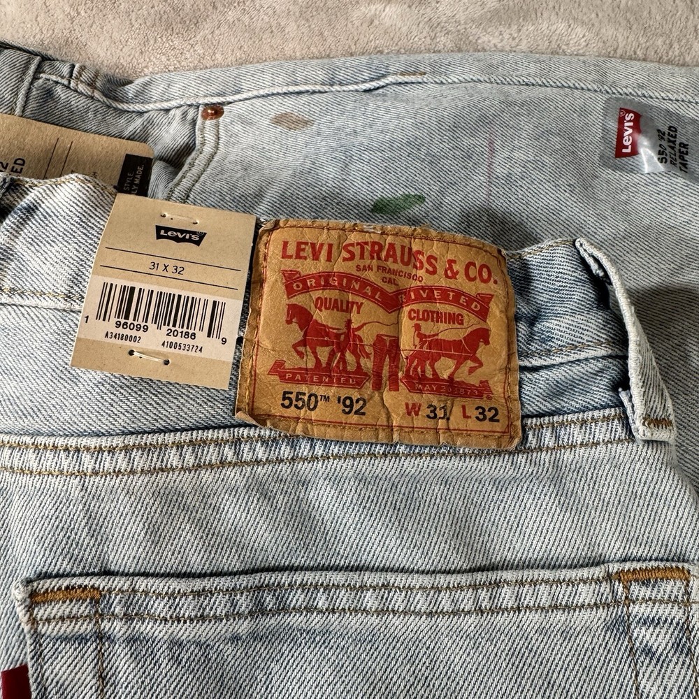 Levi's Men's 550 92 Relaxed Taper Jeans Size 31 x 32 NWT Paint Splatter Red Tab