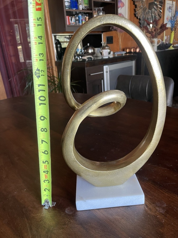Abstract Gold Metal Sculpture with White Stone Base, Modern Freestanding Art-image
