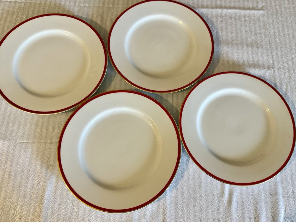 Crate and Barrel 4 piece white, red and gold porcelain plate set - 10.5