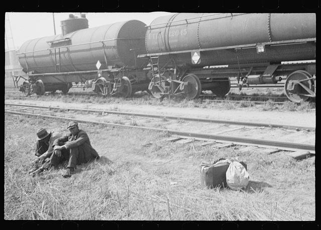 Photo:1930s Freight Train Yard Railroad Hoboes Sitting by Tank Cars