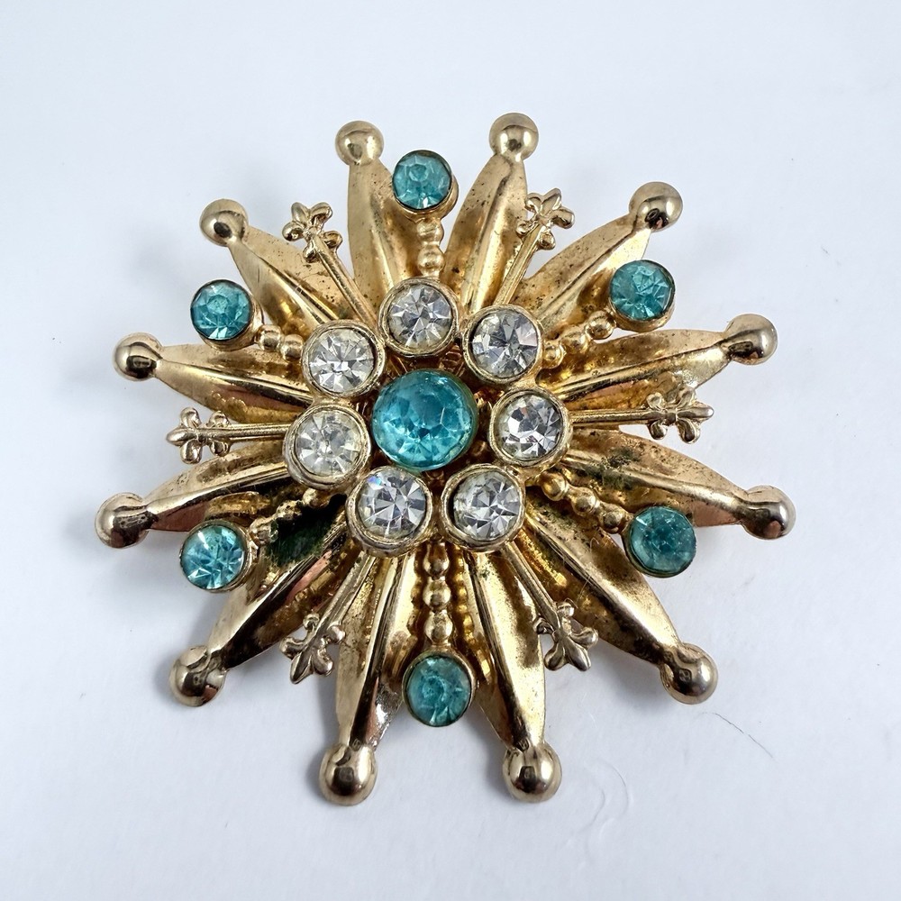 Vintage Aqua Blue & Clear Rhinestone Gold Tone Starburst Brooch Pin