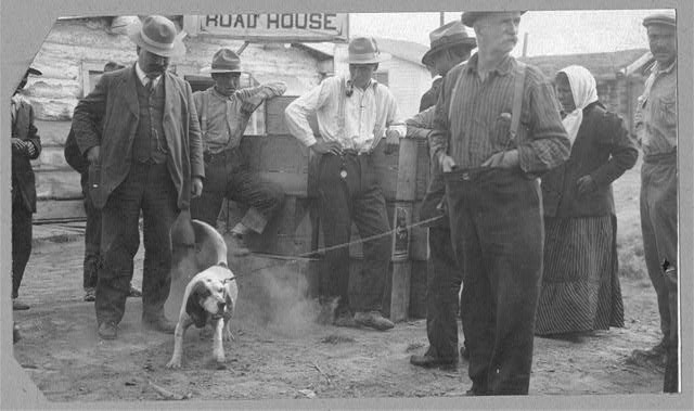 Photo:Yukon River Alaska Jim Haly with Dog at Haly's Road House c1908