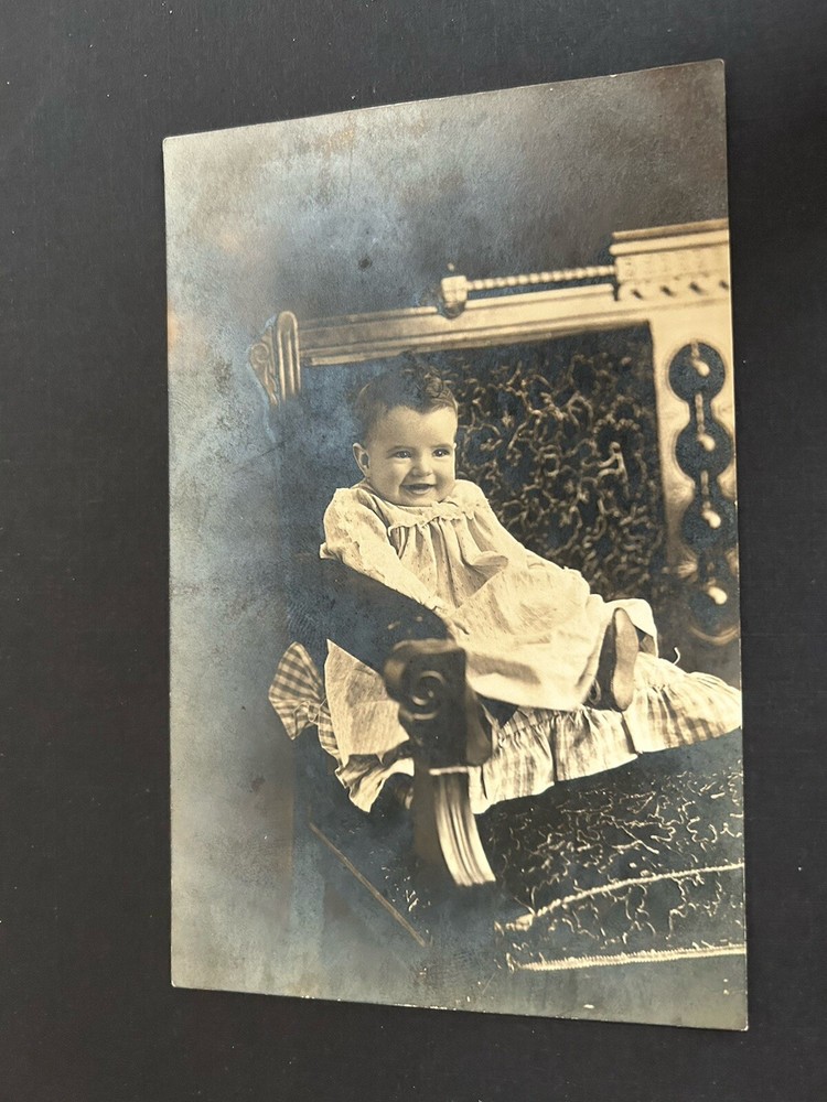 Baby Sitting on Fancy Chair RPPC Postcard