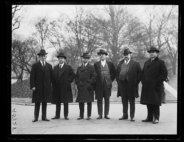 Photo:1922 Men in Overcoats and Hats Group Portrait Outdoors 1920s