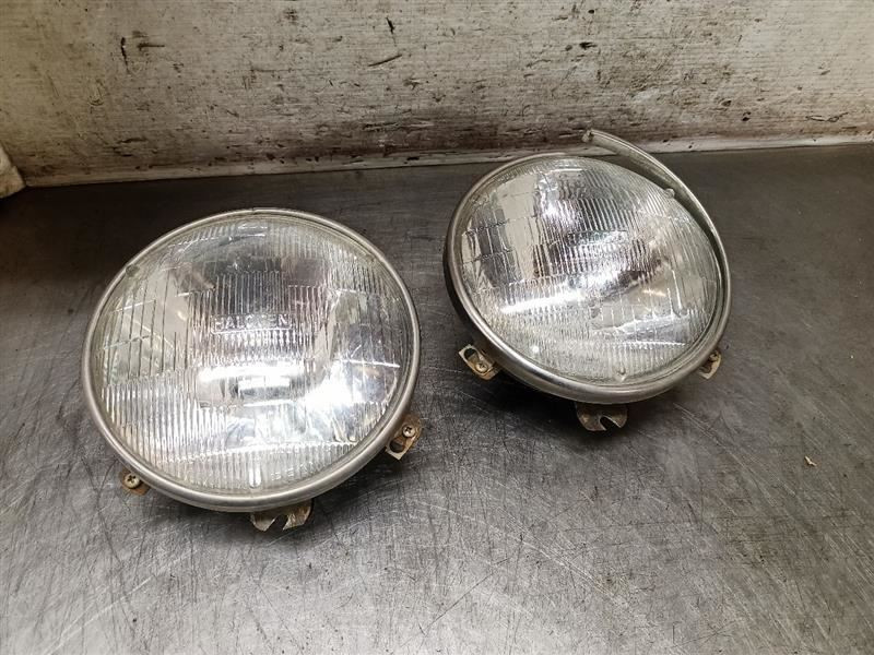 1971 Ford Maverick Headlight Buckets & Rings - OEM 10084823
