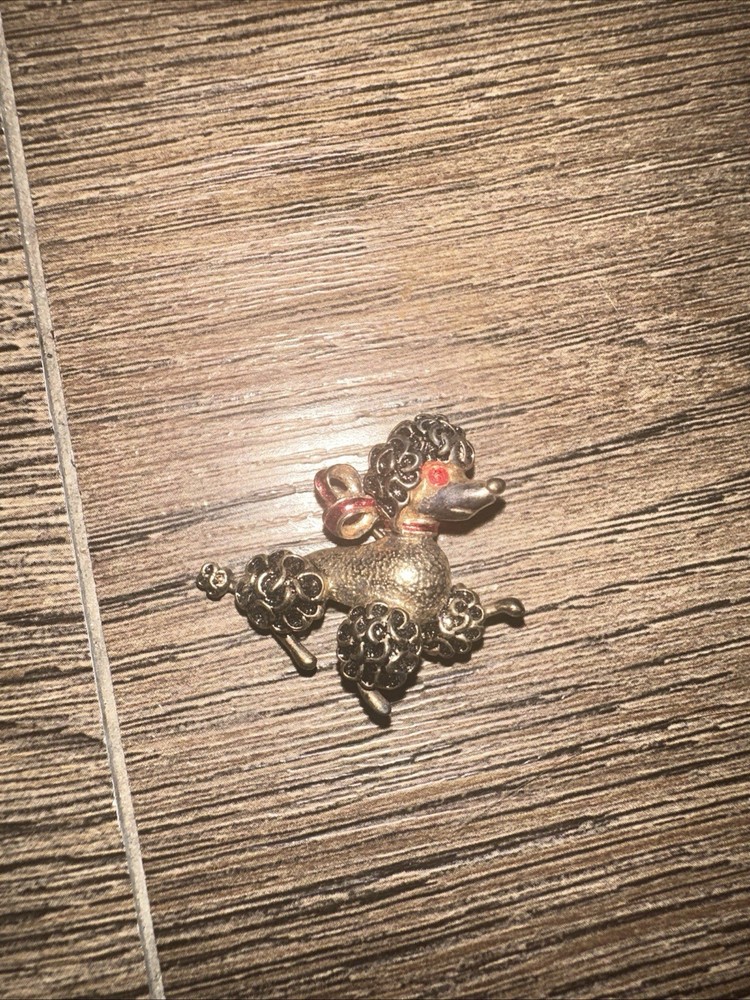 vintage gold toned signed frech poodle brooch made of sterling silver