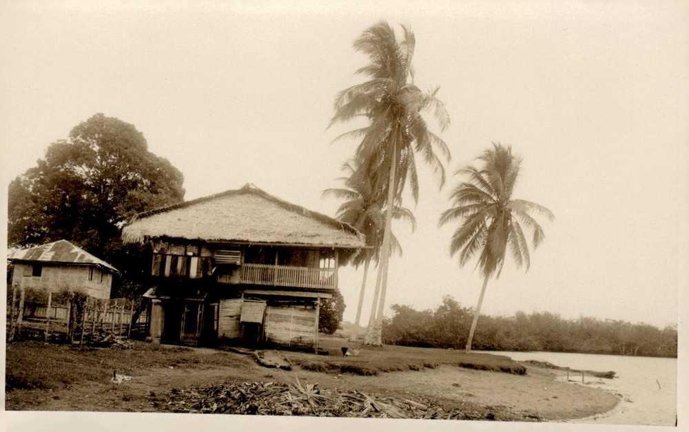 C1930s Philippines Tropical Village Scene Bahay Kubo Stilt House RPPC Postcard