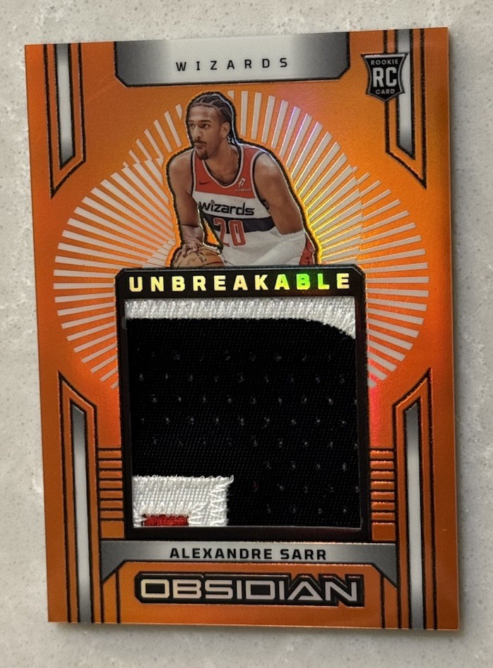 2024-25 Panini Obsidian - Unbreakable Memorabilia Alexandre Sarr E/E Orange /99
