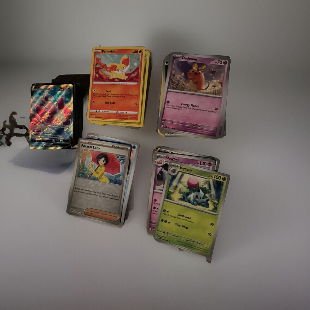 1000+ Pokemon Card Lot (includes 100+ Holo/Reverse holo)
