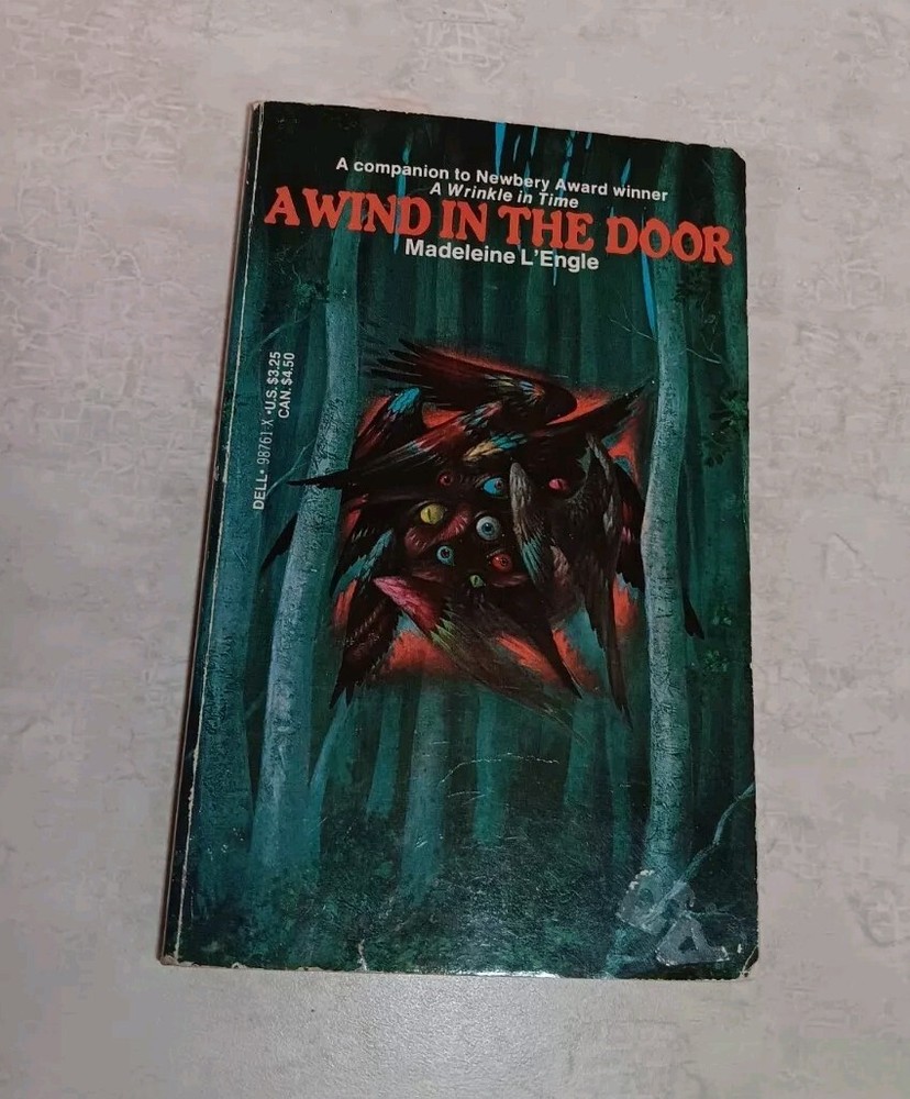 A Wind in the Door by Madeleine L'Engle, 1976 Paperback Book. some wear some old
