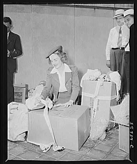 Photo:Women Packing Gifts 1940s Men in Hats Interior Scene