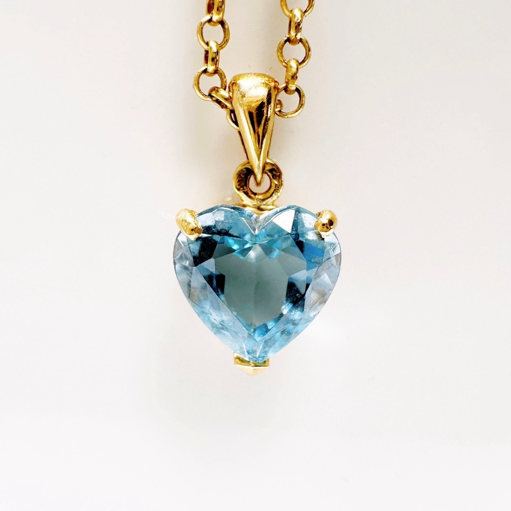 Vintage 18k Gold and blue topaz heart pendant