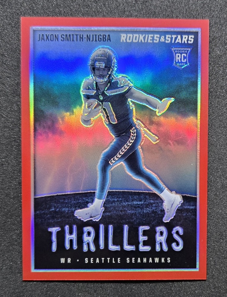 Jaxon Smith-Njigba 2023 Panini Rookies & Stars Thrillers Red Prizm /99 SEAHAWKS