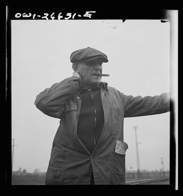 Photo:1930s Railroad Worker Man Cap Cigar Portrait